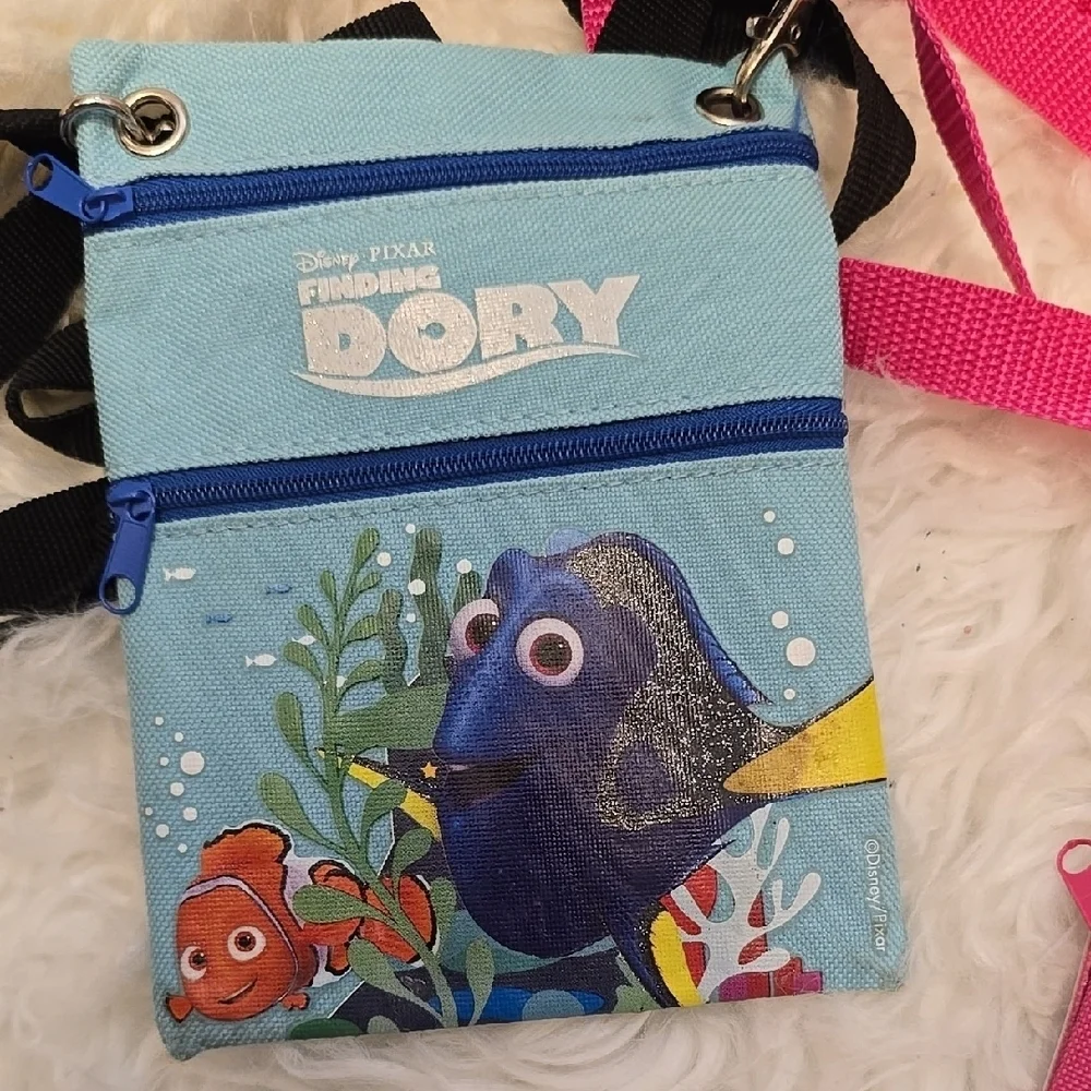 Blue and Pink Crossbody Bags with Character Designs